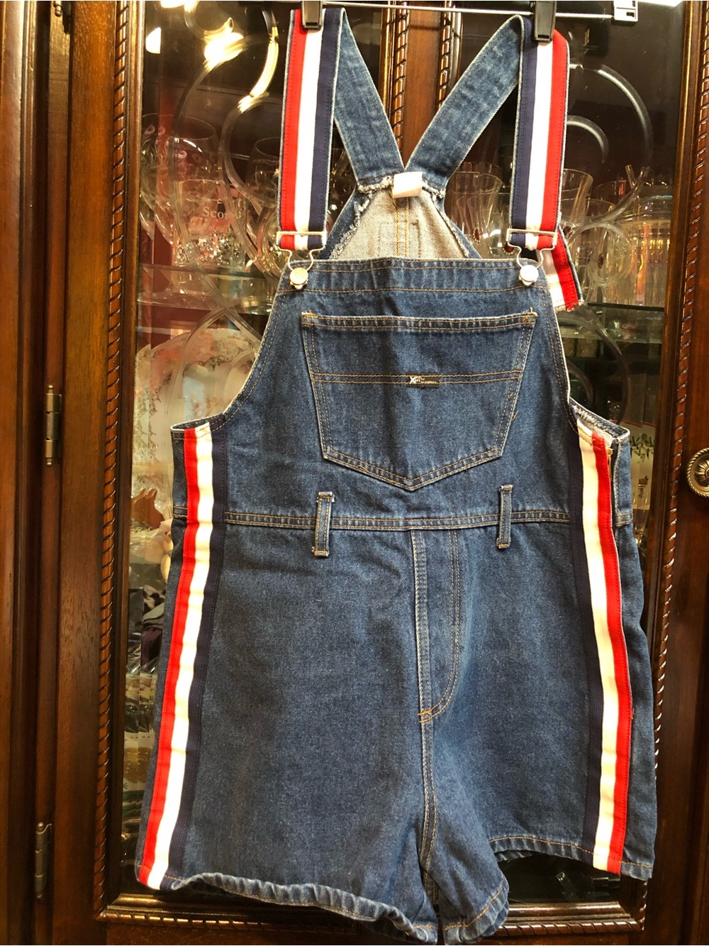 Woman’s Blue Denim Short Overalls with Red and White Stripe Accents